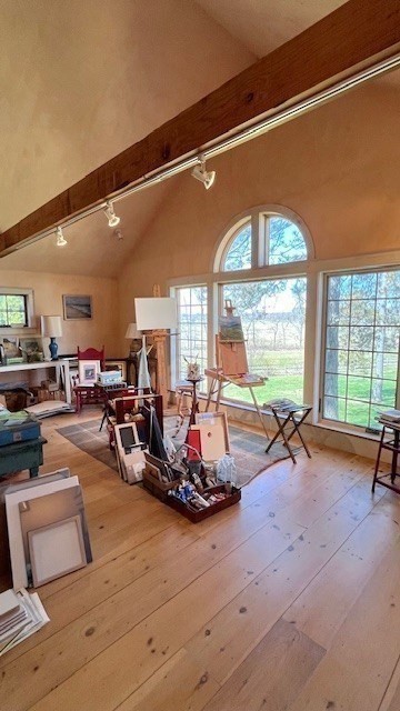 6 Northgate Road Ipswich, MA 01938 - Photo 37 of 42 a room with lots of tables a large window and chairs