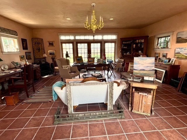 6 Northgate Road Ipswich, MA 01938 - Photo 40 of 42 a living room with patio furniture and a chandelier