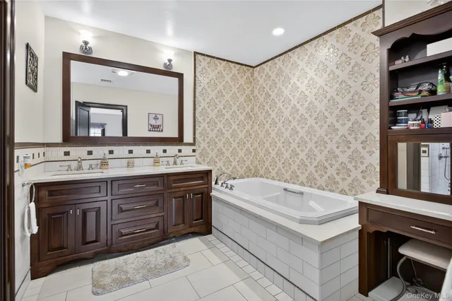 a spacious bedroom with a large bed and a large window