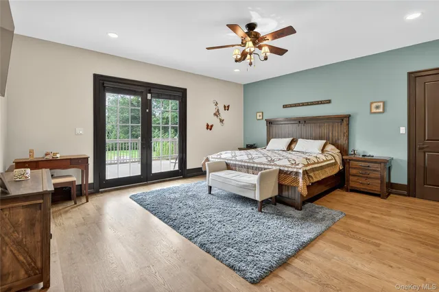 a view of a roof deck with wooden floor and fence