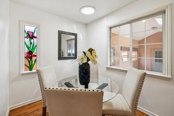 a bed room with a bed and a chair