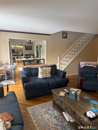 a view of a livingroom with furniture and a fireplace