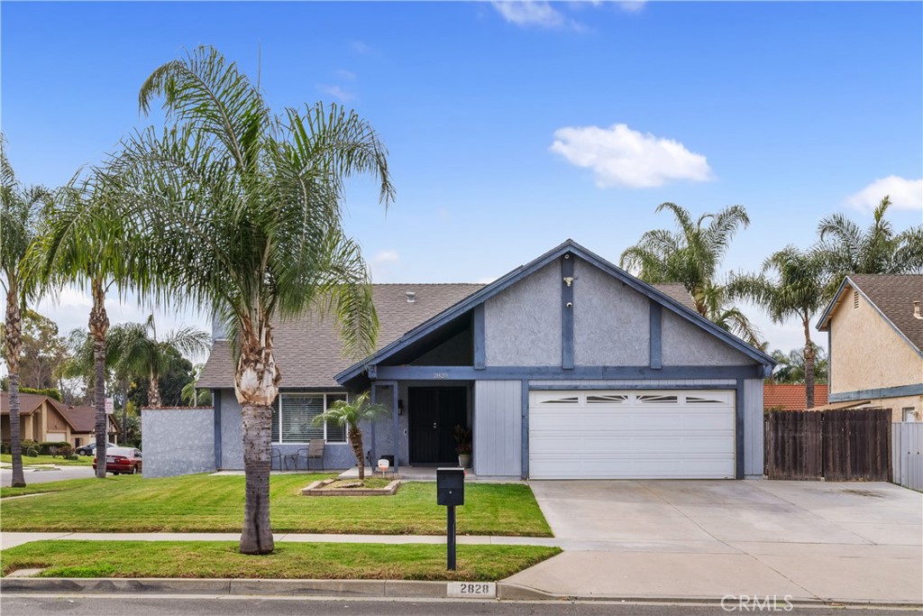 2828 Fenwick Place Riverside, CA 92504 - Photo 1 of 1 a front view of a house with a yard