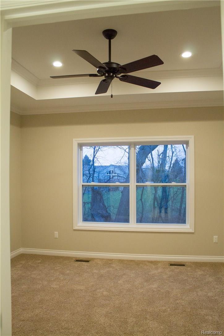 1901 Fiddler Court, Unit 7 Howell, MI 48843 - Photo 31 of 77 Tray ceiling in master bedroom with fan..... Beautiful!