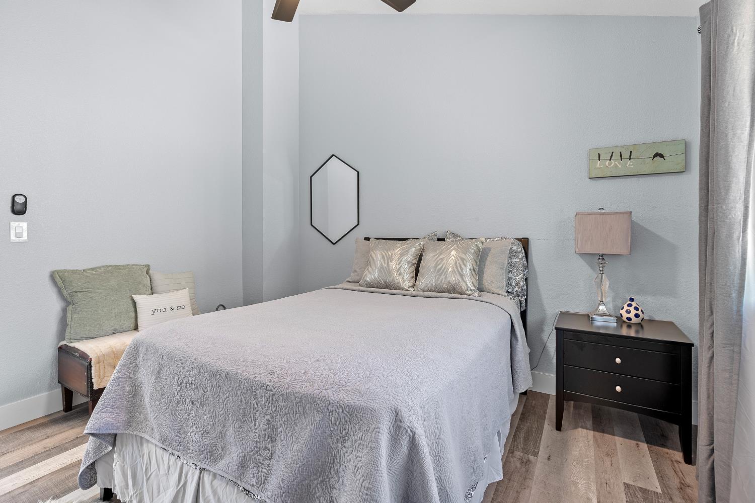 8170 Grizzly Flat Road Somerset, CA 95684 - Photo 25 of 43 a bedroom with a bed and a table