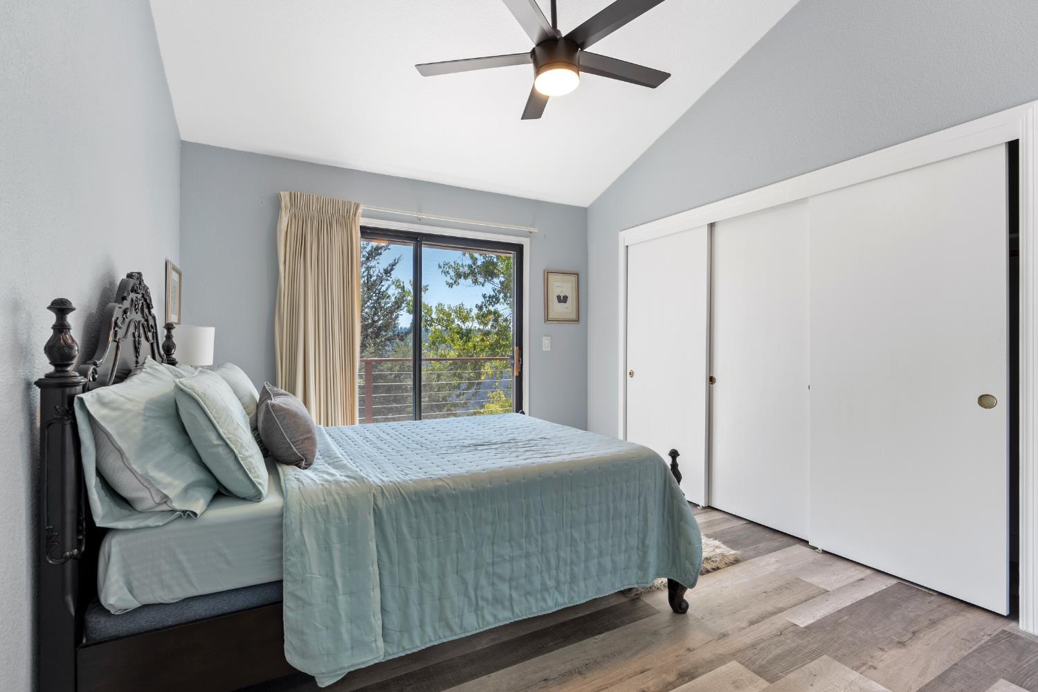 8170 Grizzly Flat Road Somerset, CA 95684 - Photo 26 of 43 a bedroom with a bed and window