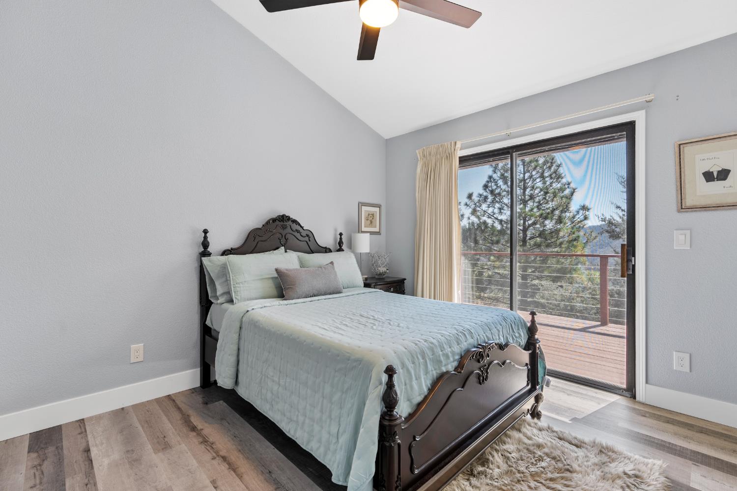 8170 Grizzly Flat Road Somerset, CA 95684 - Photo 27 of 43 a bedroom with a bed and window