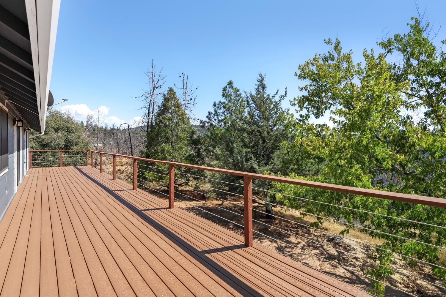 8170 Grizzly Flat Road Somerset, CA 95684 - Photo 39 of 43 a view of balcony with wooden floor and fence