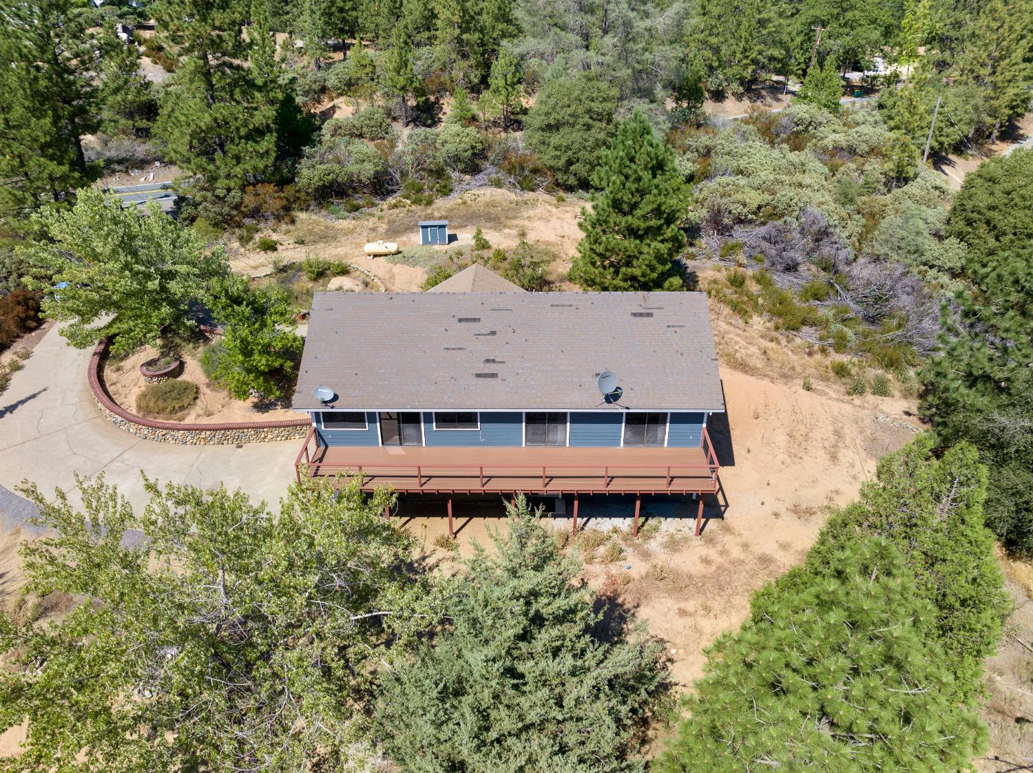8170 Grizzly Flat Road Somerset, CA 95684 - Photo 41 of 43 an aerial view of a house with a yard