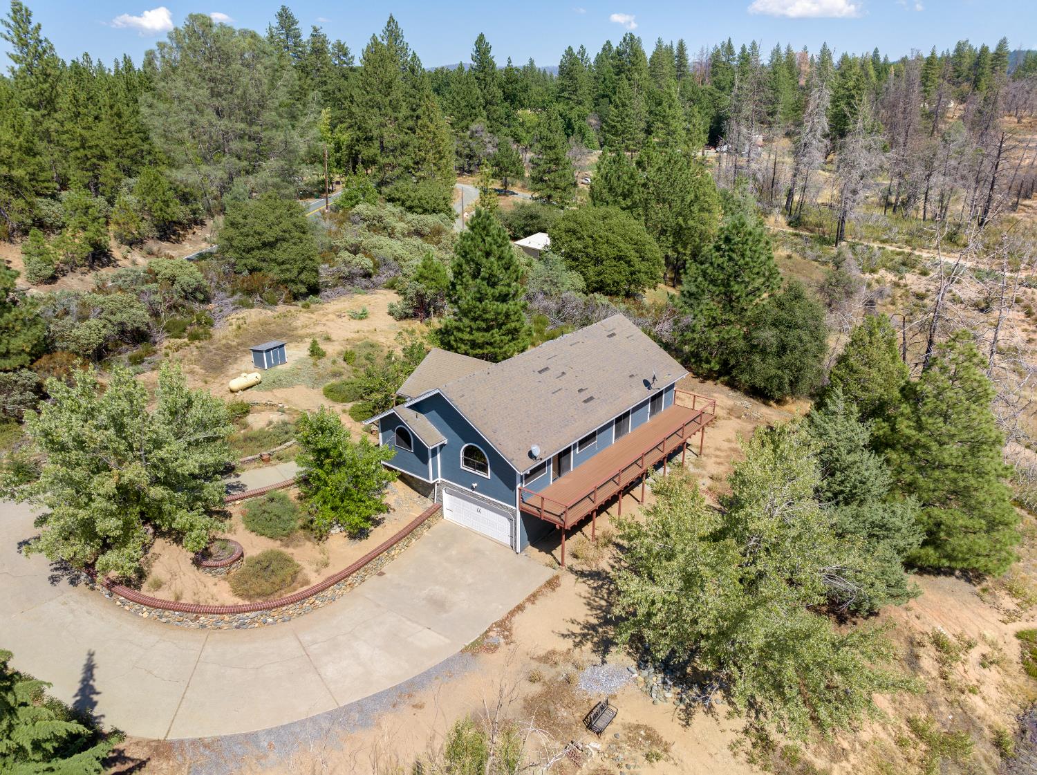 8170 Grizzly Flat Road Somerset, CA 95684 - Photo 42 of 43 an aerial view of a house with a yard