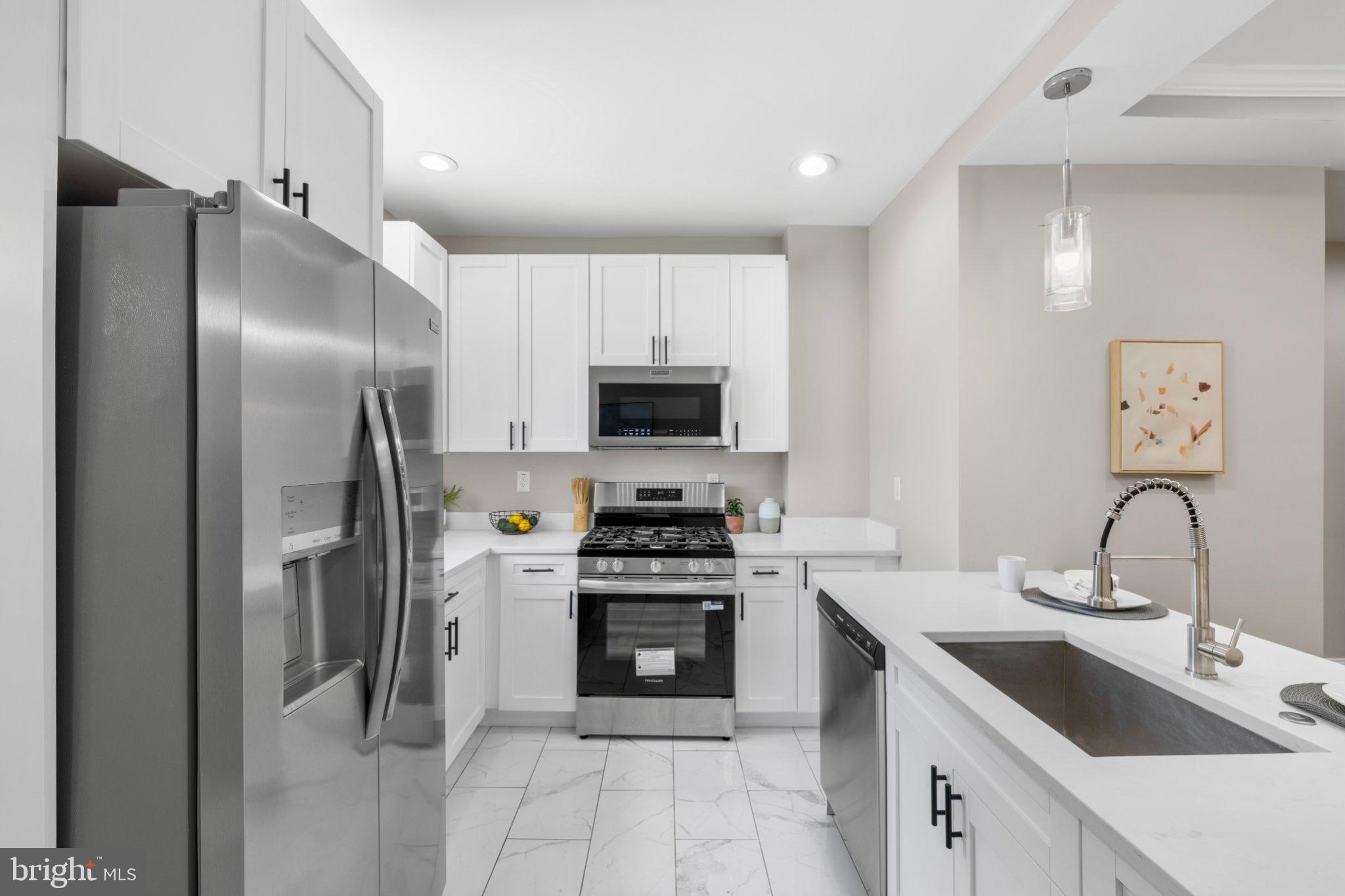 145 North Monastery Avenue Baltimore, MD 21229 - Photo 8 of 45 Modern kitchen with sleek finishes.