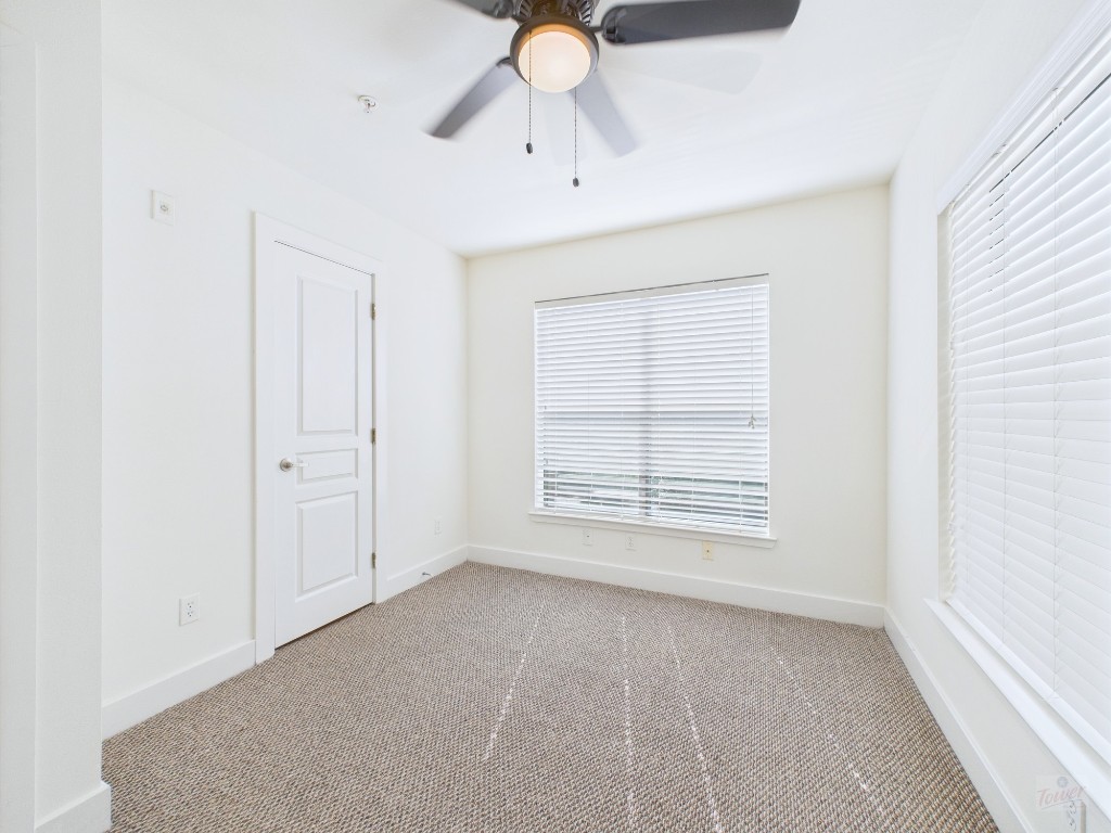 711 West 32nd Street, Unit 151 Austin, TX 78705 - Photo 17 of 21 a view of an empty room with a window