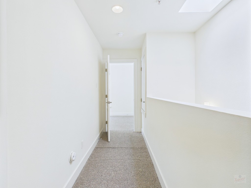 711 West 32nd Street, Unit 151 Austin, TX 78705 - Photo 9 of 21 a view of hallway with stairs