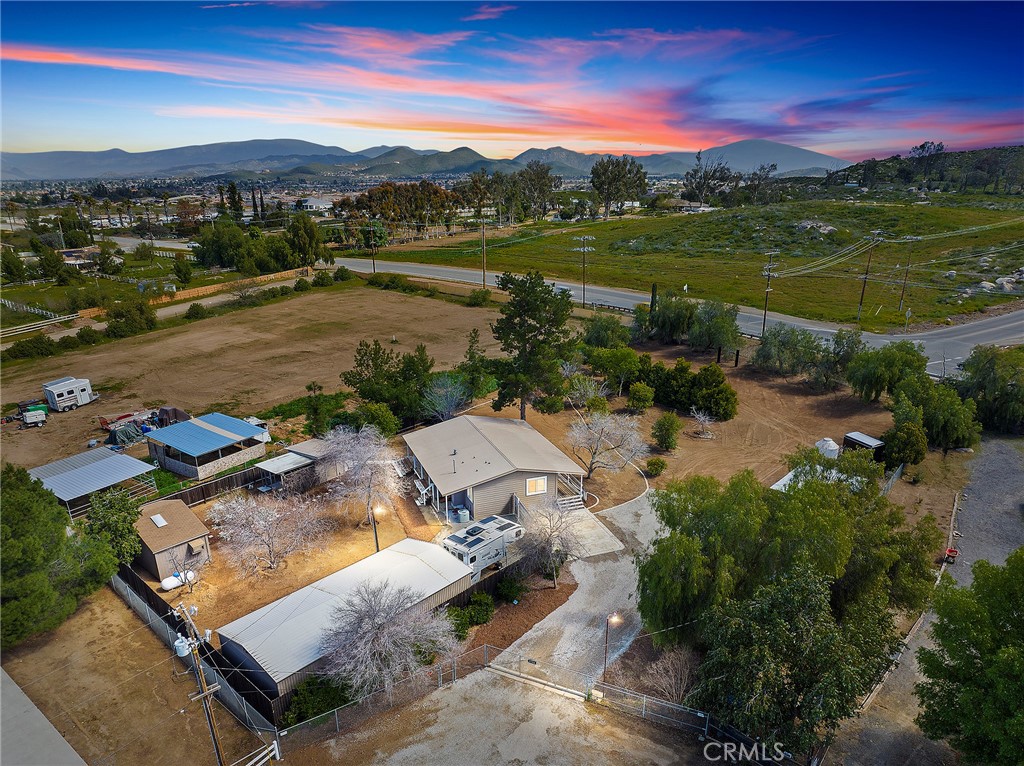 25988 Surrey Road Menifee, CA 92584 - Photo 1 of 1 a view of a lake with a city