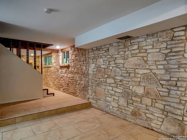a view of a dining room with furniture and window