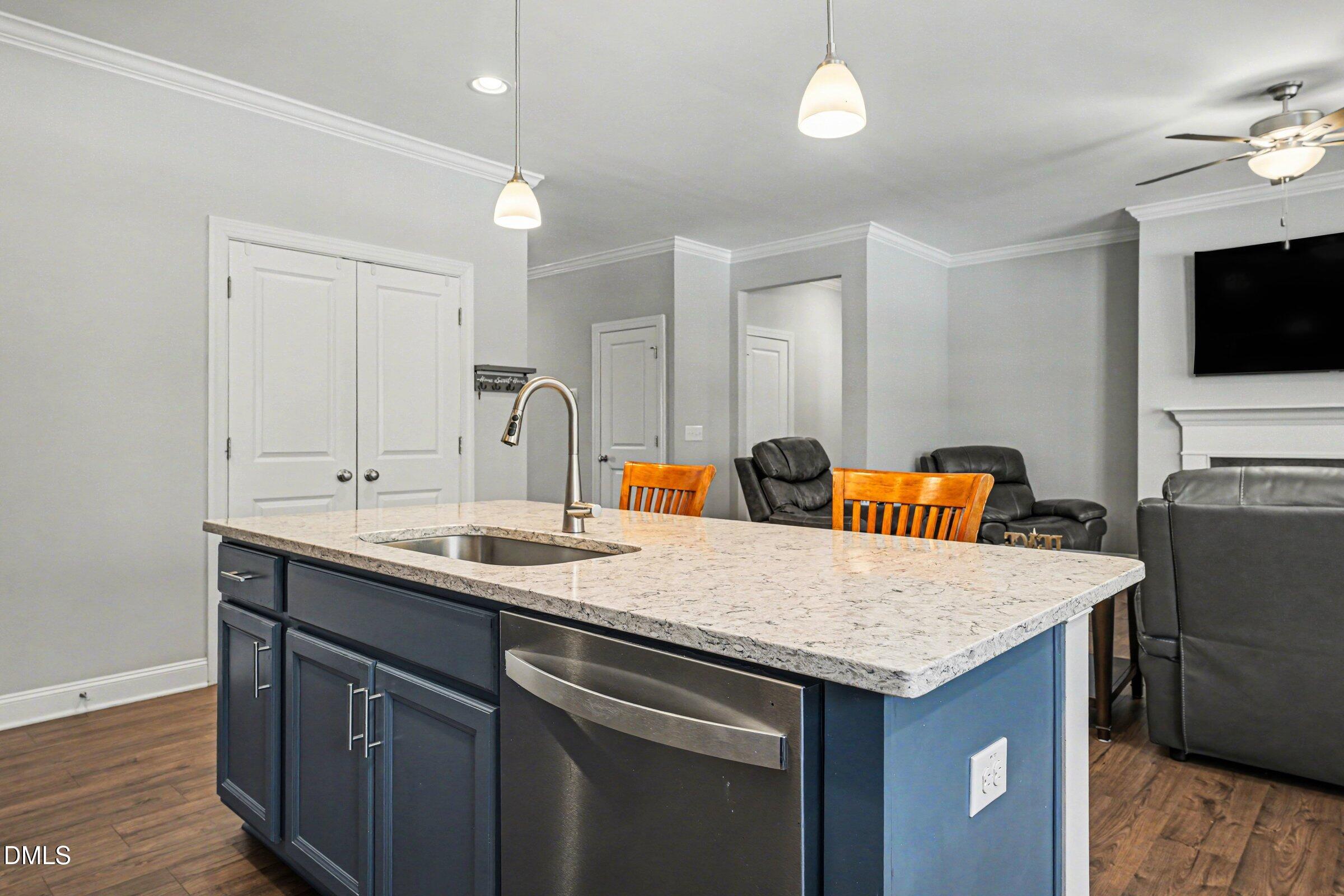 130 Aylebury Ridge Zebulon, NC 27597 - Photo 11 of 41 a kitchen that has a sink and a microwave