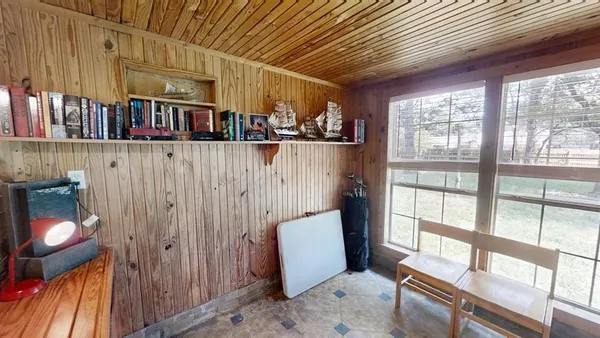 a view of living room with a large window