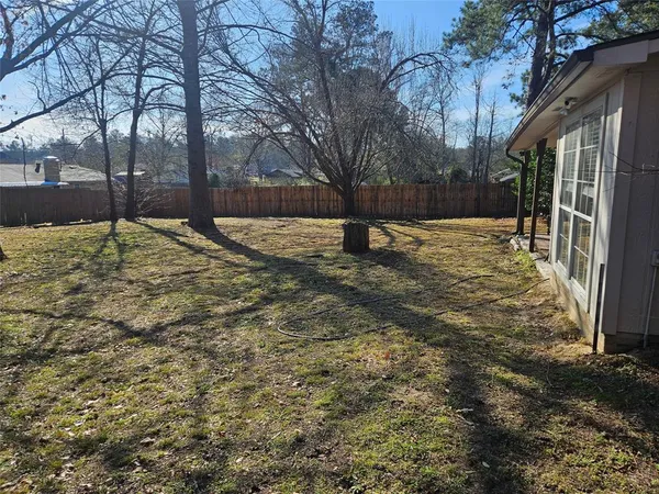 a house with trees in front of it