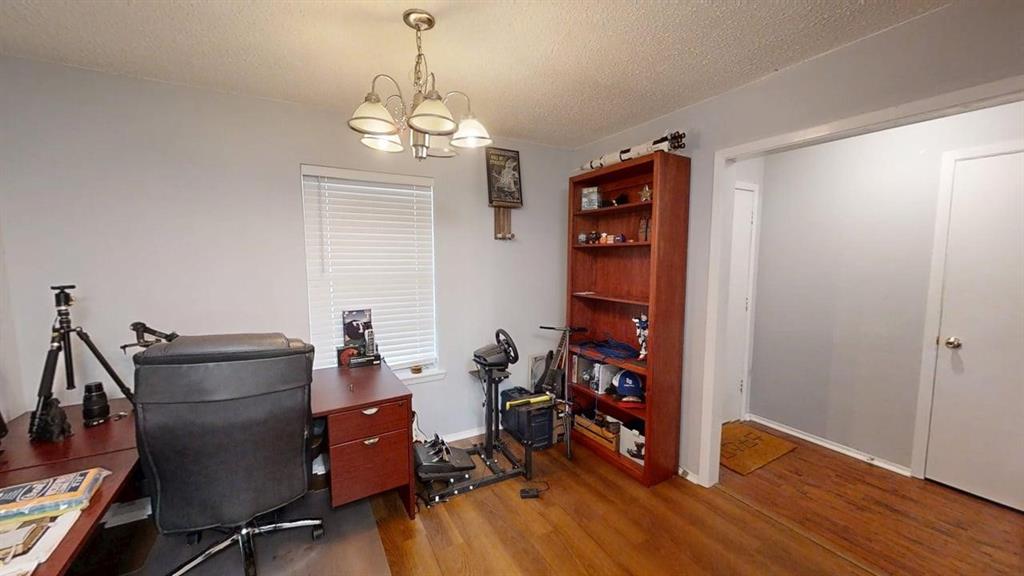 16455 Red Fern Road Flint, TX 75762 - Photo 7 of 25 a view of a workspace with furniture and wooden floor