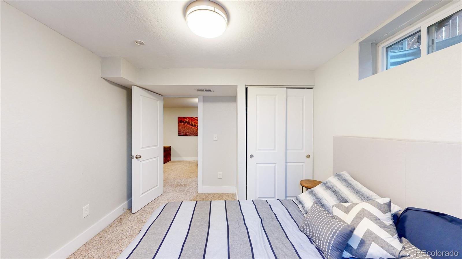 1741 West 55th Place Denver, CO 80221 - Photo 23 of 36 wooden floor in an empty room