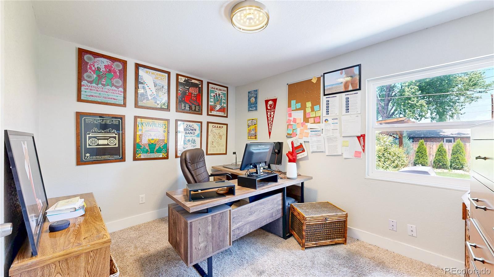 1741 West 55th Place Denver, CO 80221 - Photo 8 of 36 a room with furniture and a window