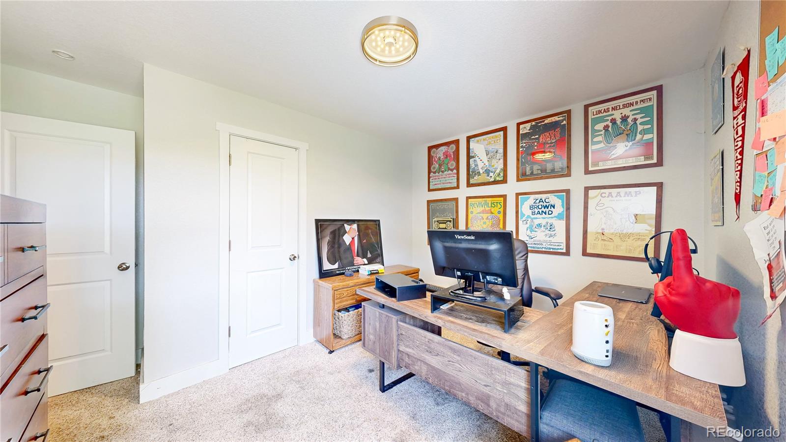 1741 West 55th Place Denver, CO 80221 - Photo 9 of 36 a room with furniture and a window