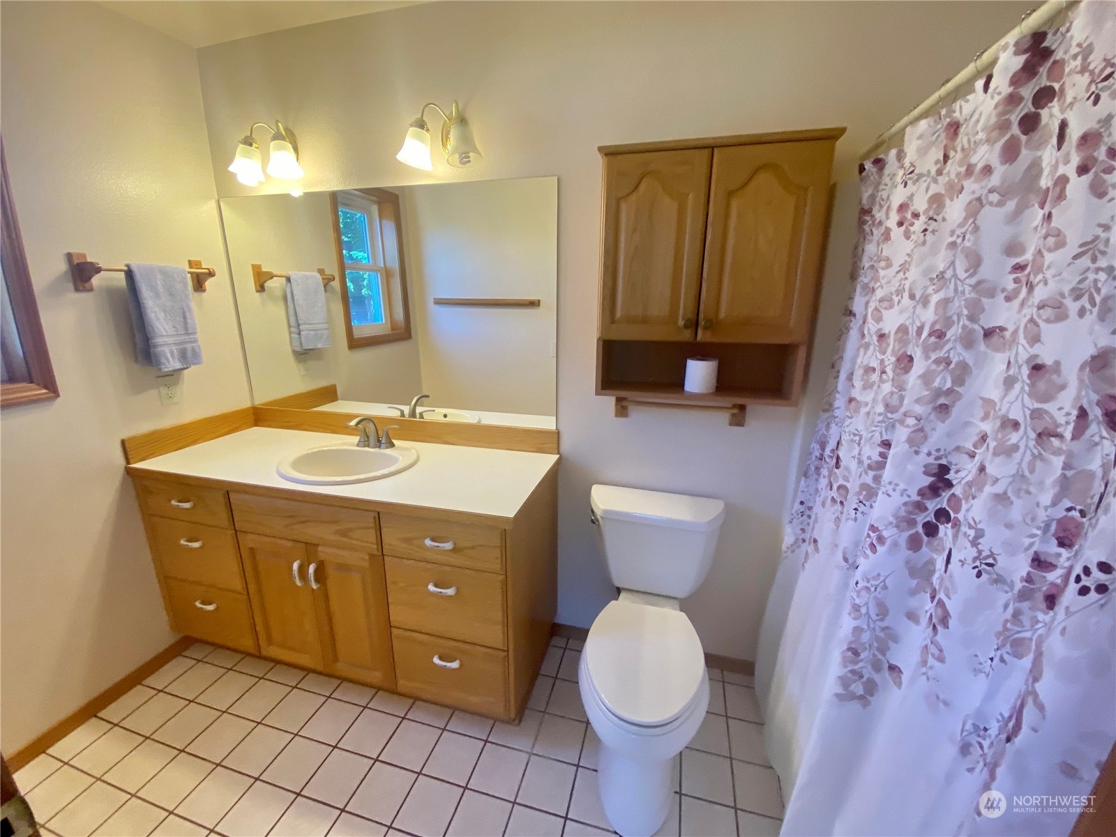 130 Cline Road Sequim, WA 98382 - Photo 31 of 35 a bathroom with a sink a toilet and shower