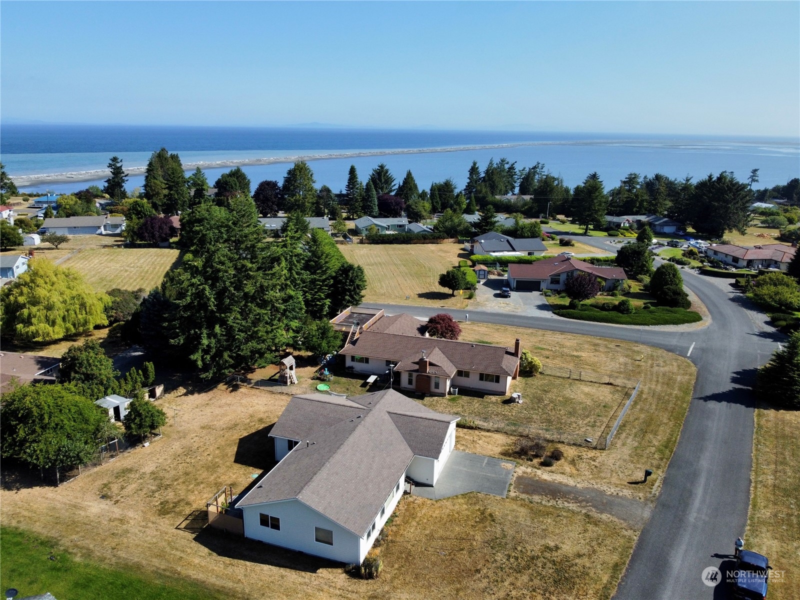 130 Cline Road Sequim, WA 98382 - Photo 35 of 35 an aerial view of multiple houses with yard