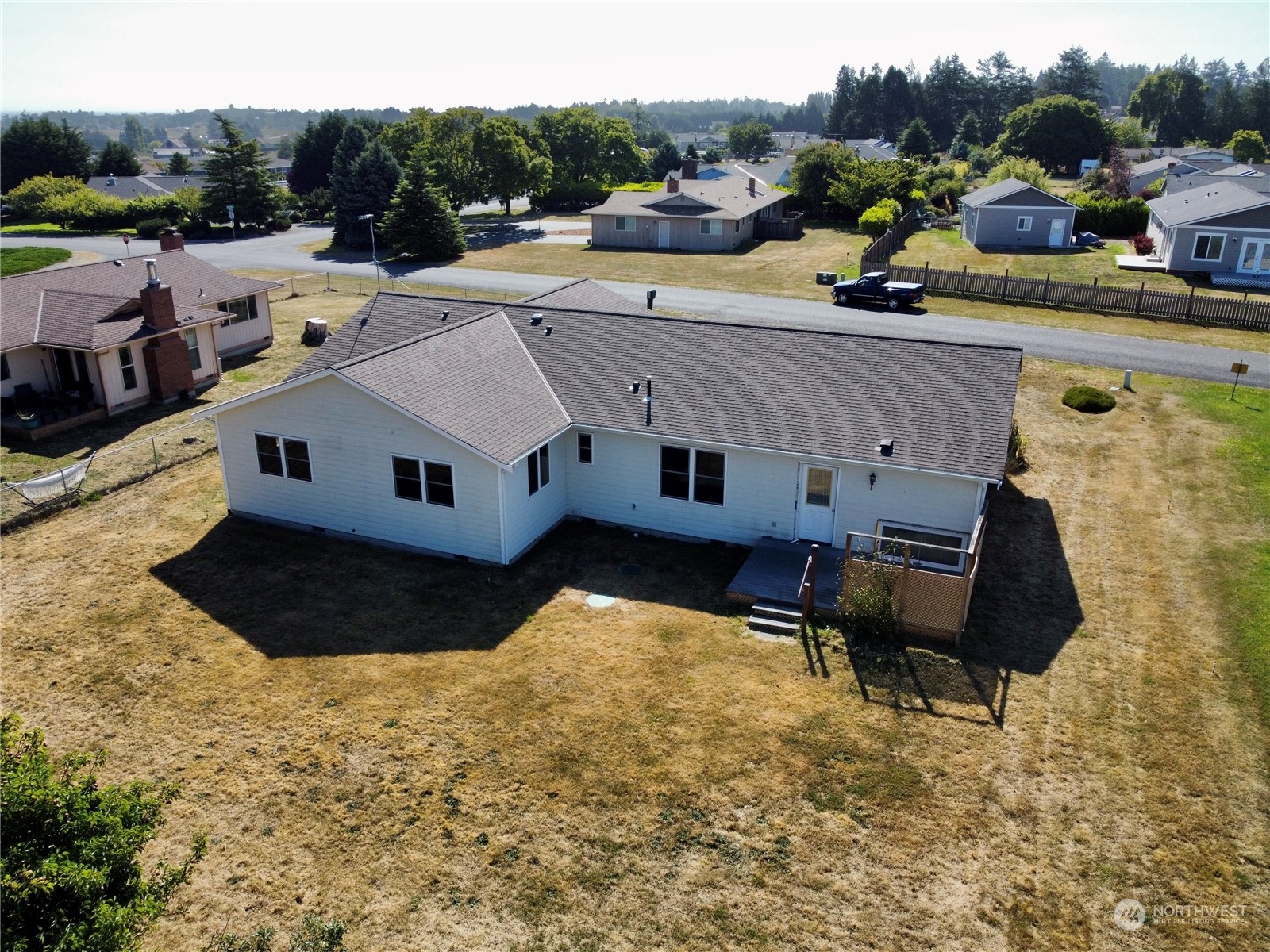 130 Cline Road Sequim, WA 98382 - Photo 5 of 35 a view of a swimming pool with lounge chairs