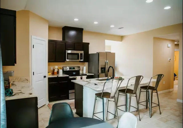 a view of a dining room with furniture