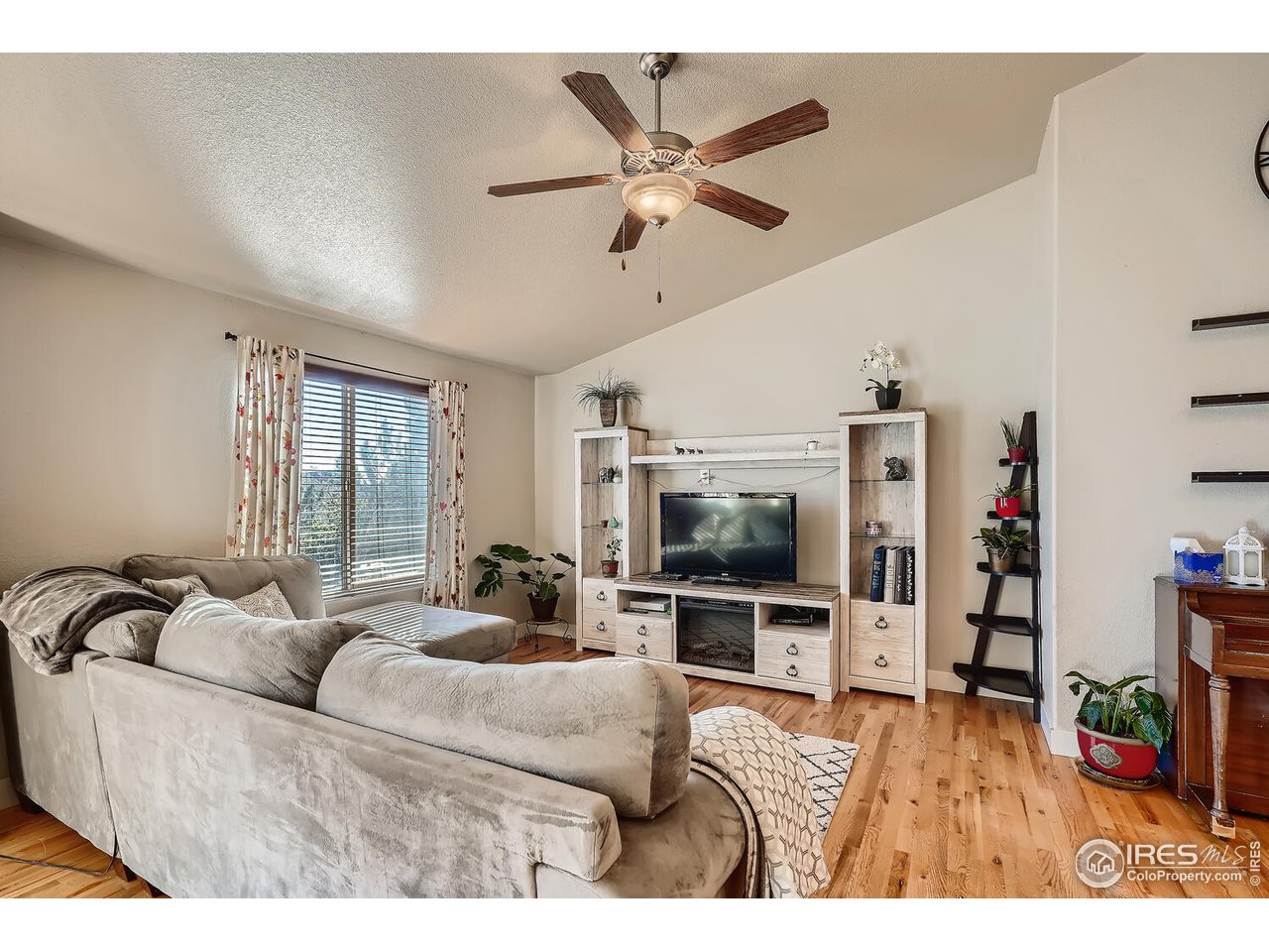 884 Cliffrose Way Severance, CO 80550 - Photo 12 of 30 So much light on the main floor!