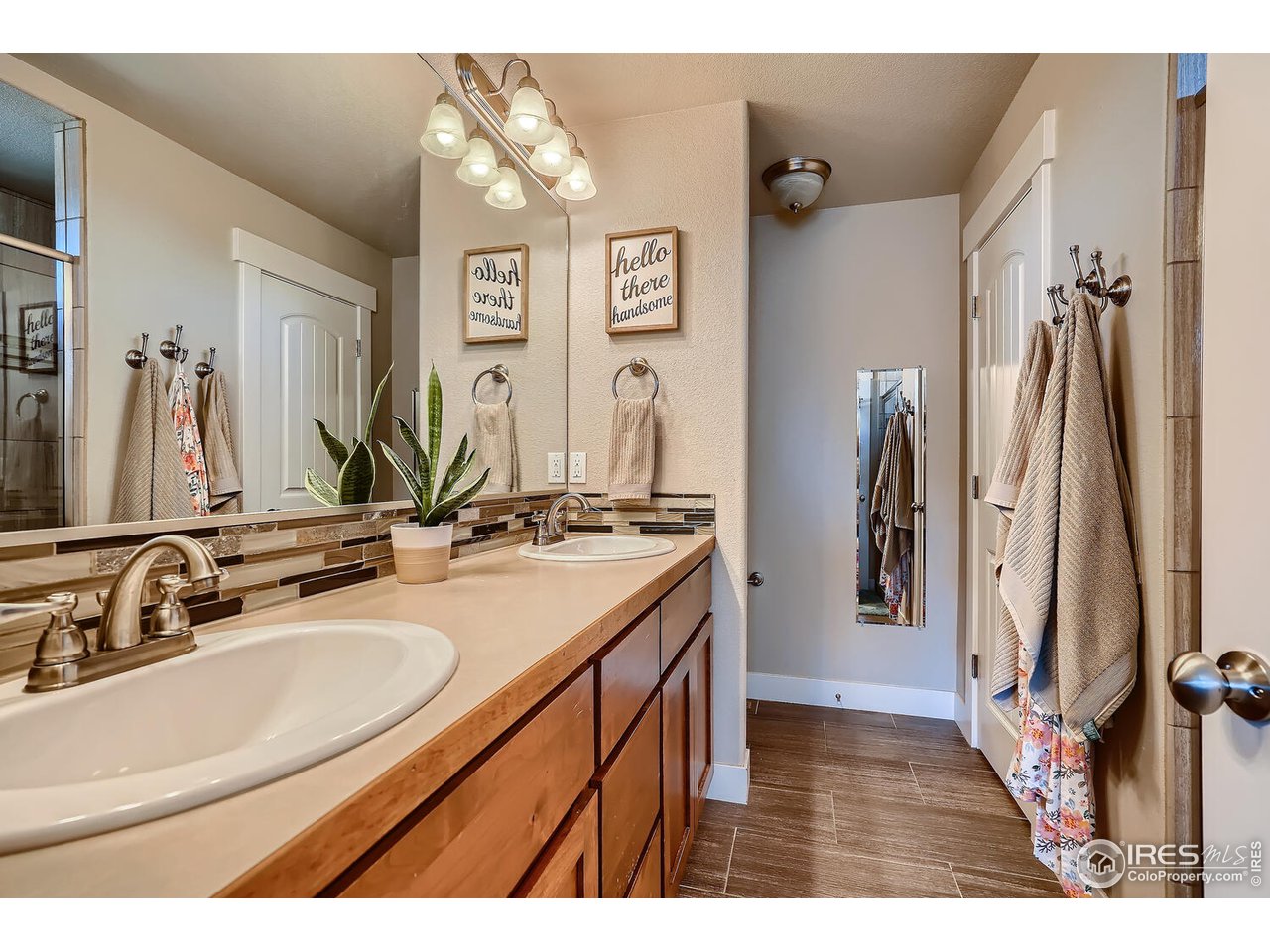 884 Cliffrose Way Severance, CO 80550 - Photo 17 of 30 Primary Master Bath Double Sinks
