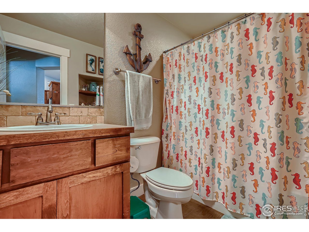 884 Cliffrose Way Severance, CO 80550 - Photo 18 of 30 Main Floor Full Bathroom