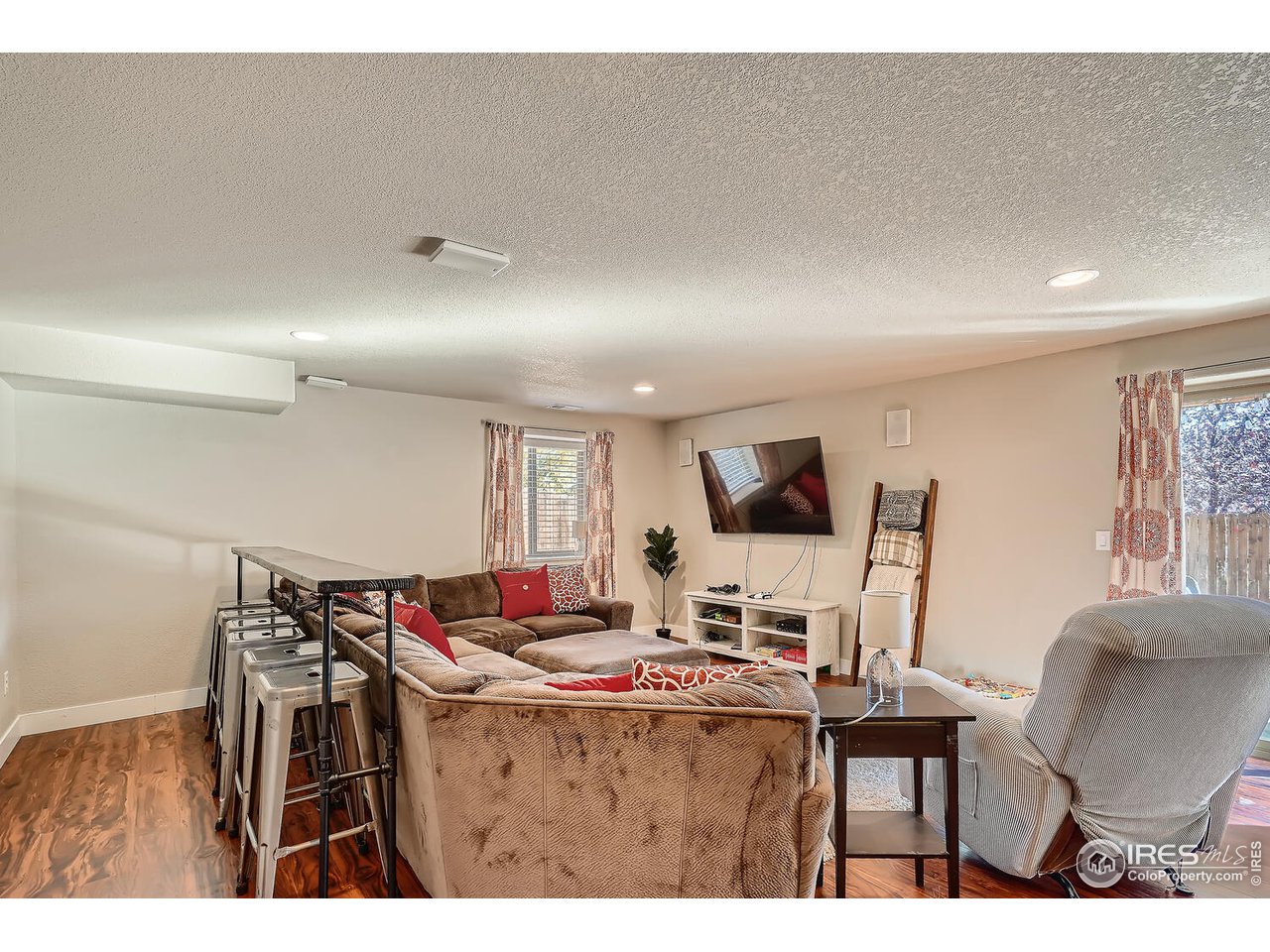 884 Cliffrose Way Severance, CO 80550 - Photo 23 of 30 Great Room downstairs