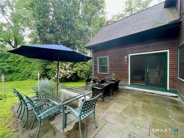 298 Erskine Road Stamford, CT 06903 - Photo 9 of 21 French doors to Slate Patio