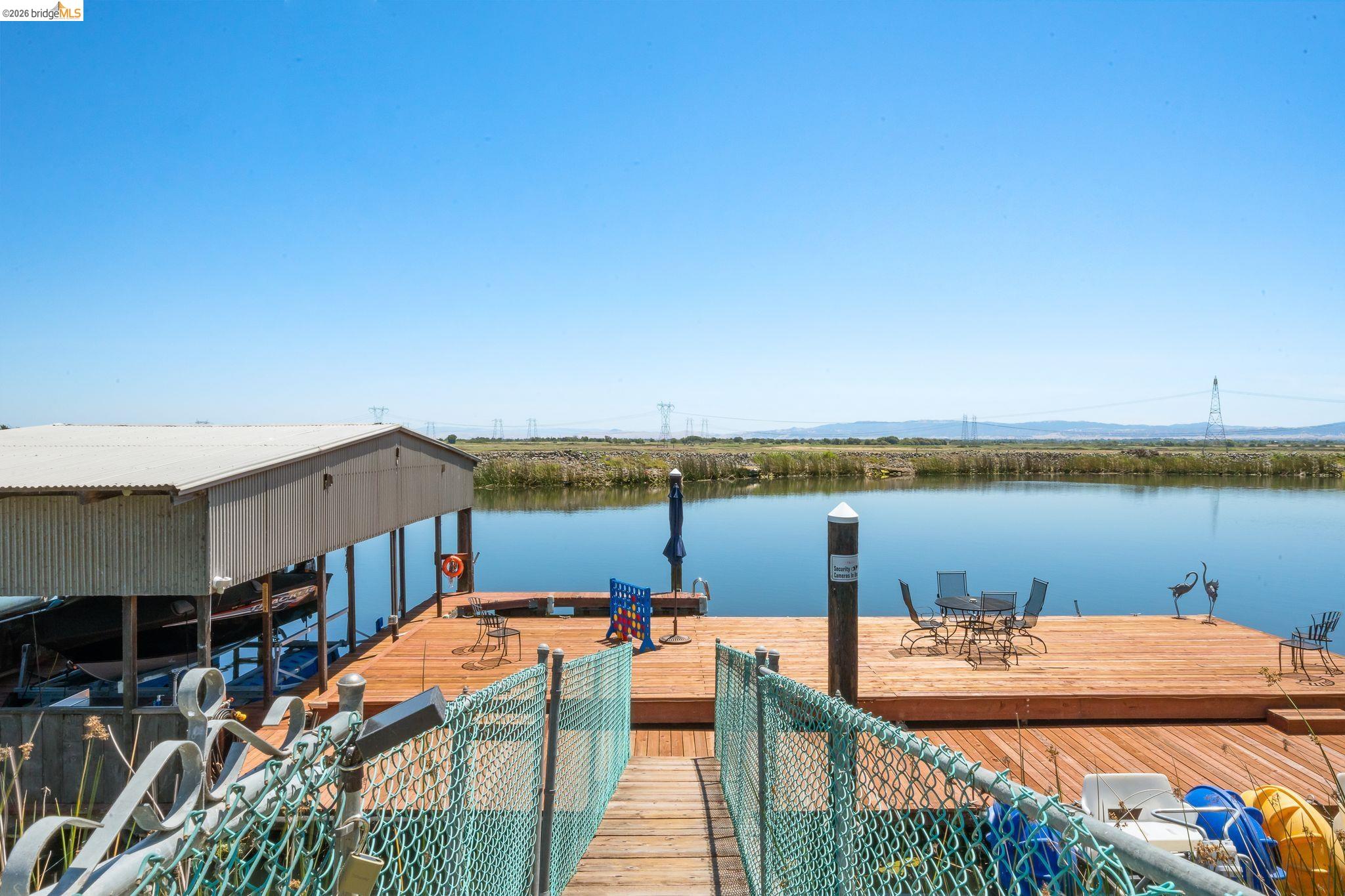 1704 Taylor Road Bethel Island, CA 94511 - Photo 60 of 73 Private dock featuring a spacious wood-finish deck