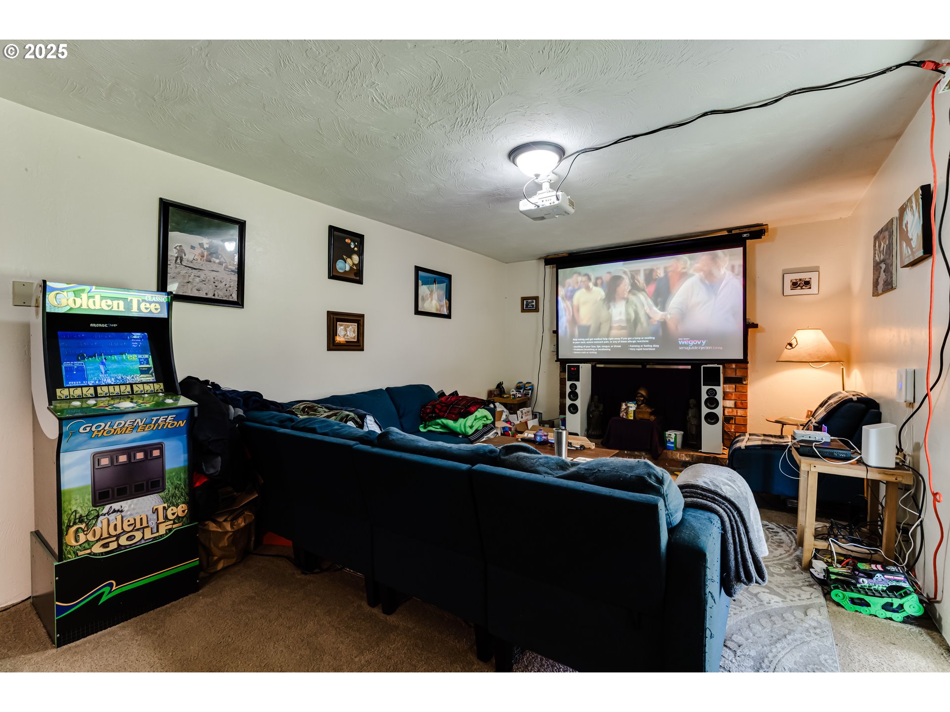 3911 Pam Street Eugene, OR 97402 - Photo 11 of 25 a room with furniture and a fireplace