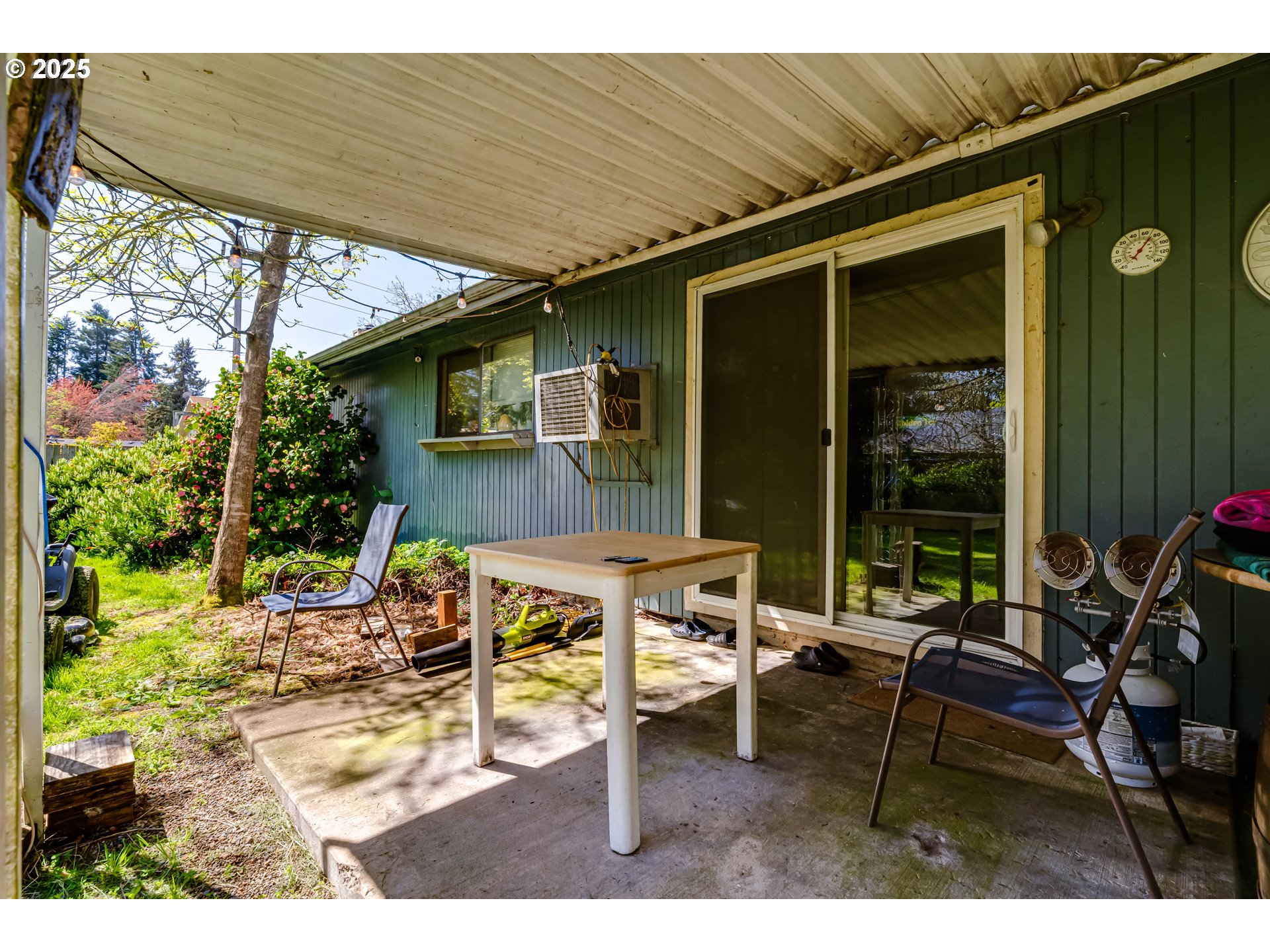 3911 Pam Street Eugene, OR 97402 - Photo 13 of 25 a backyard of a house with outdoor seating