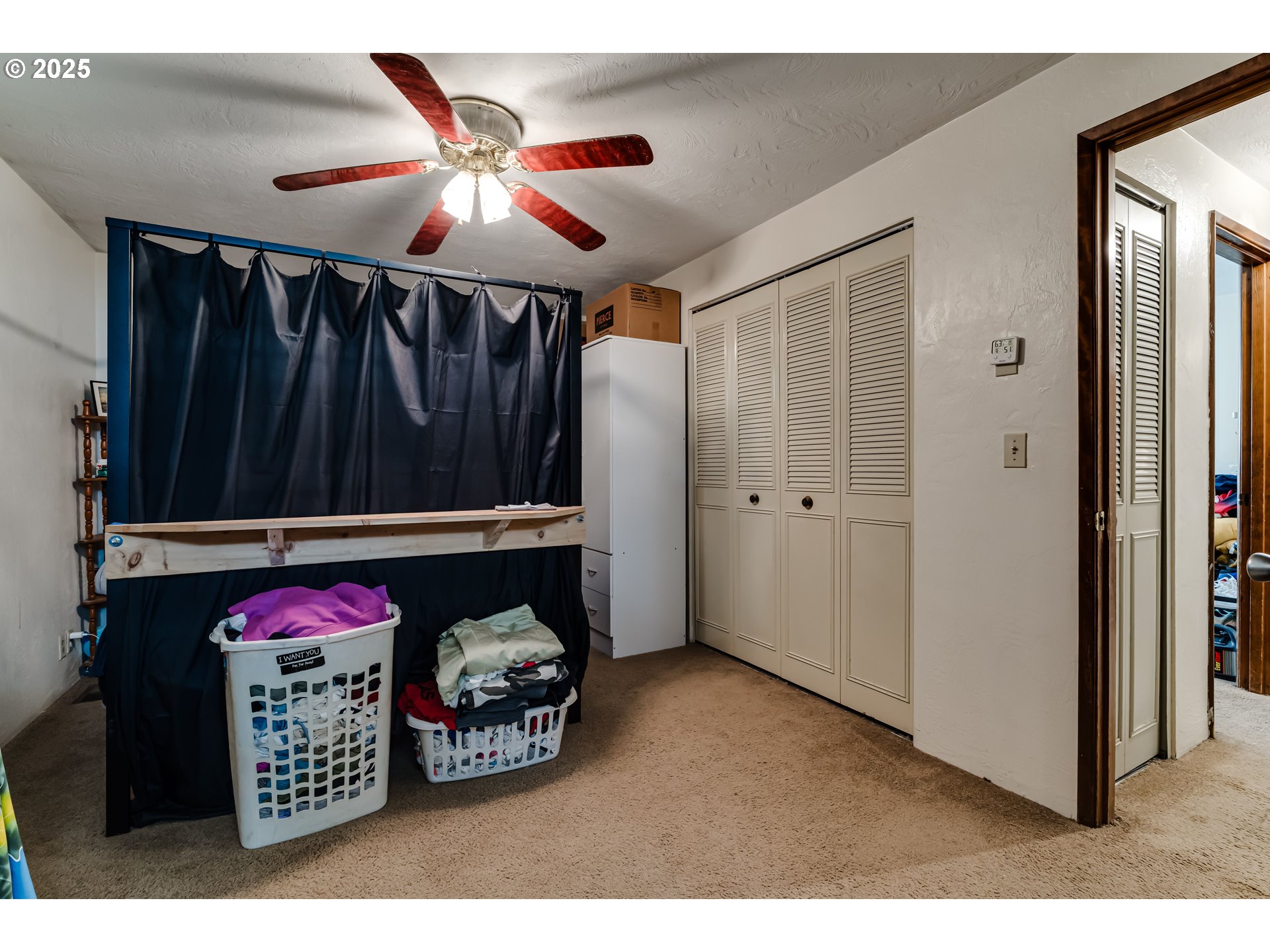 3911 Pam Street Eugene, OR 97402 - Photo 15 of 25 a bedroom with a bed and a window
