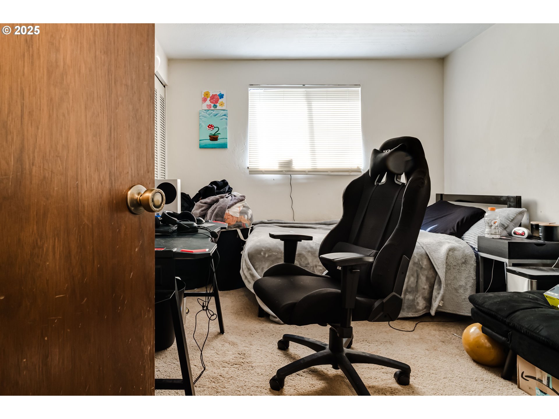 3911 Pam Street Eugene, OR 97402 - Photo 21 of 25 a view of a workspace with furniture and a window