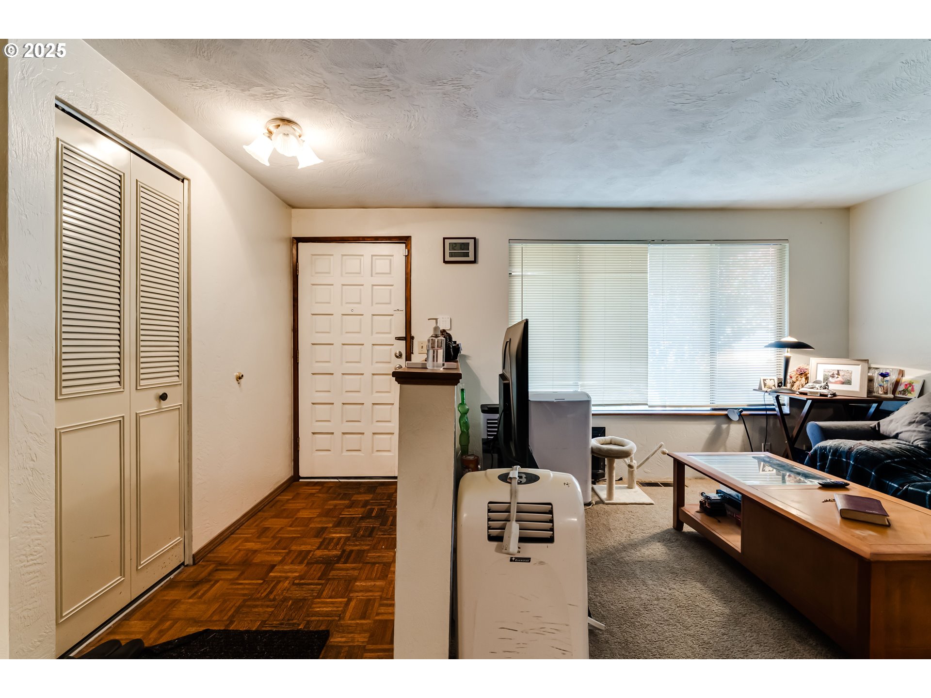 3911 Pam Street Eugene, OR 97402 - Photo 4 of 25 a living room with furniture and large window
