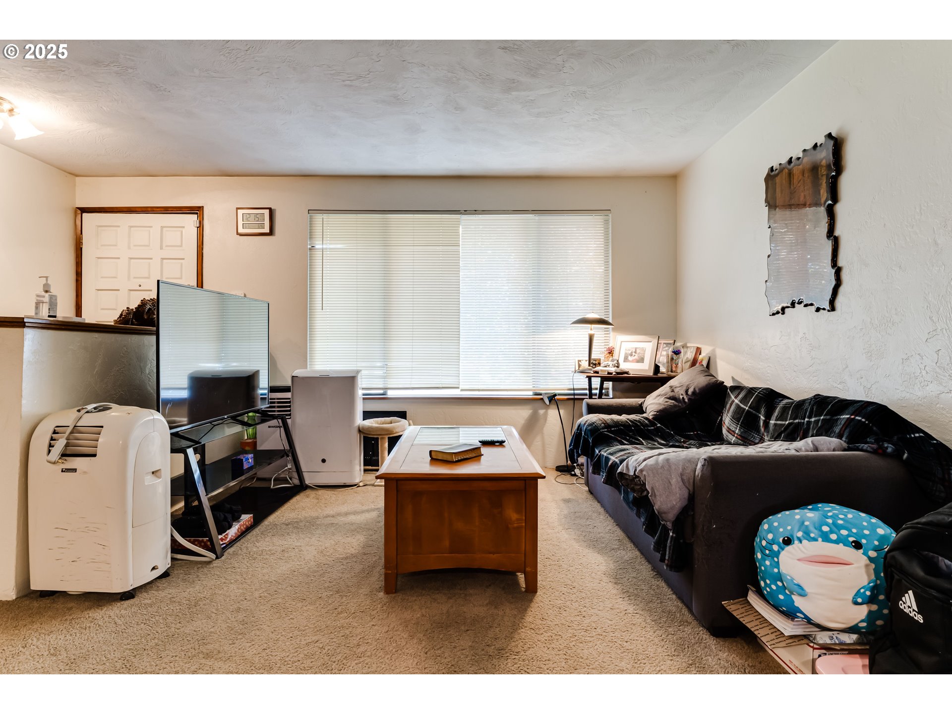 3911 Pam Street Eugene, OR 97402 - Photo 6 of 25 a living room with furniture and a window