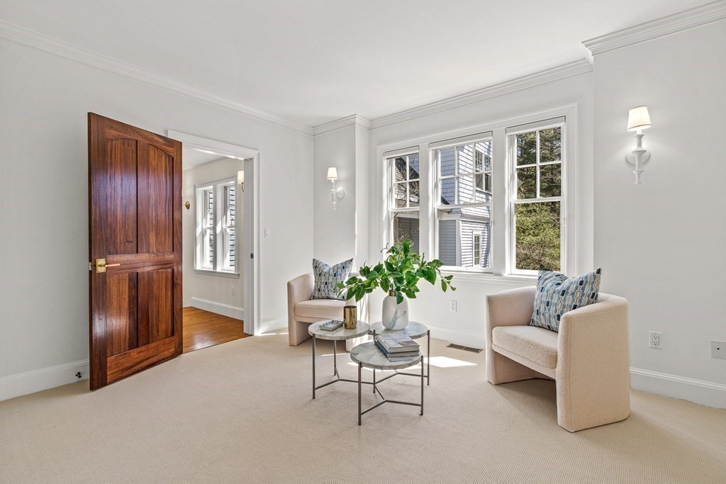 47 Cypress Road Wellesley, MA 02481 - Photo 18 of 36 a living room with furniture and windows