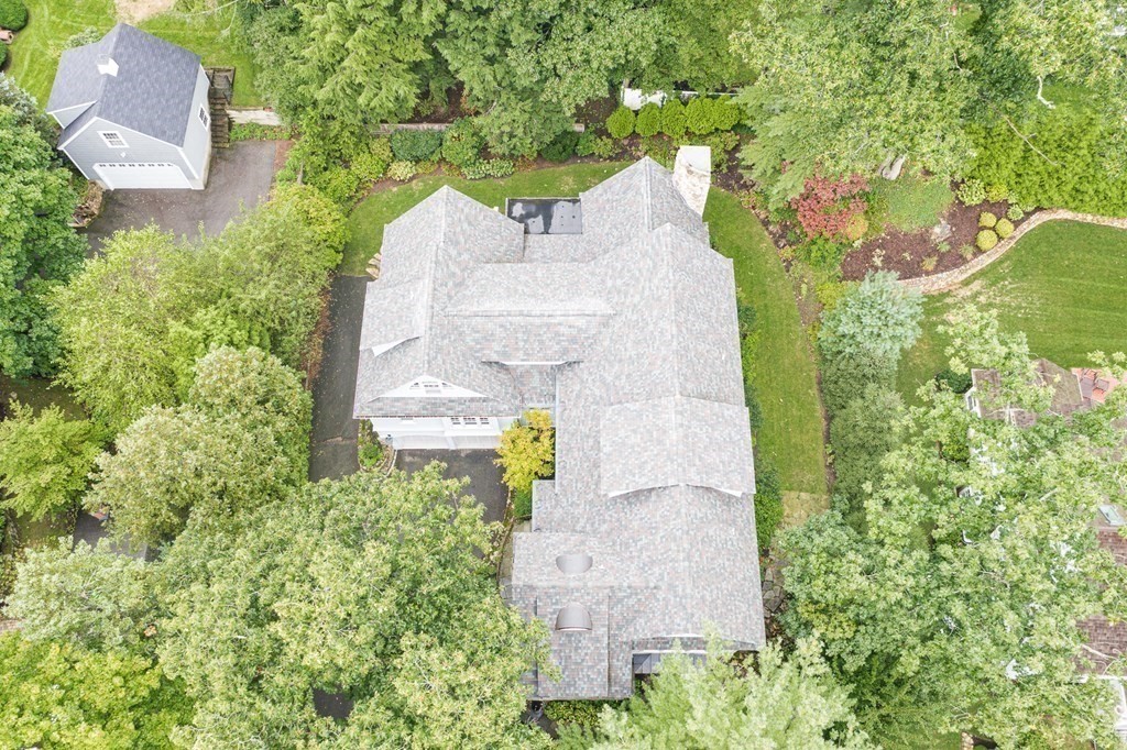 47 Cypress Road Wellesley, MA 02481 - Photo 2 of 36 an aerial view of a house with a yard and trees