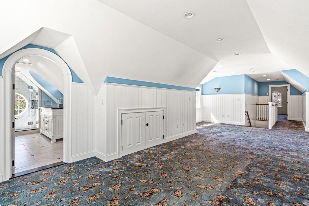 47 Cypress Road Wellesley, MA 02481 - Photo 24 of 36 a view of a hallway with entryway and kitchen area