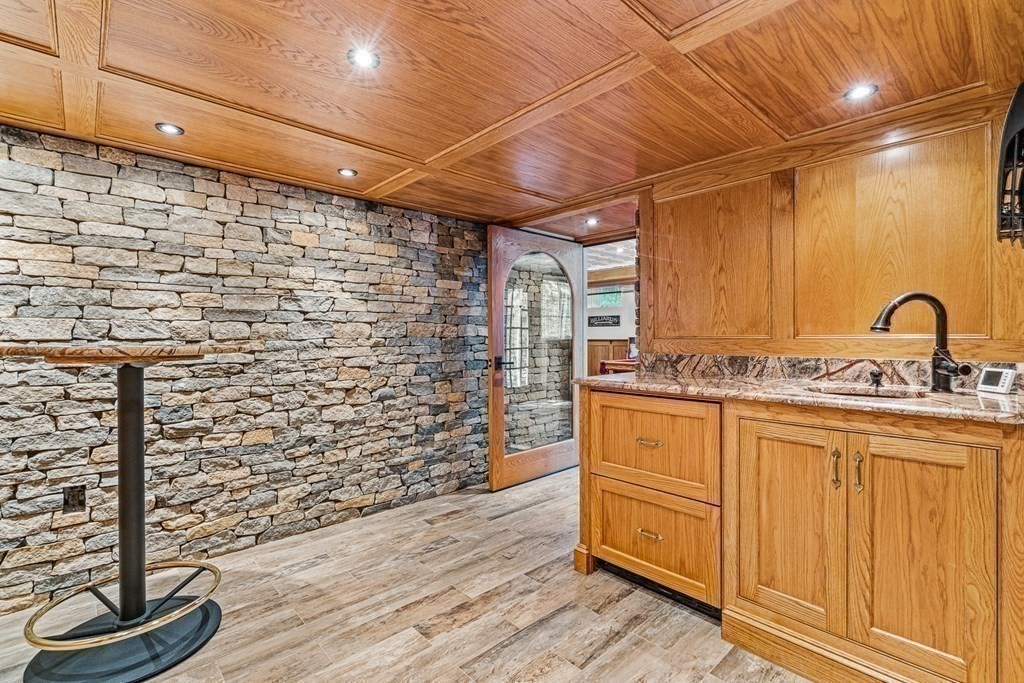 47 Cypress Road Wellesley, MA 02481 - Photo 29 of 36 a bathroom with a sink and a shower