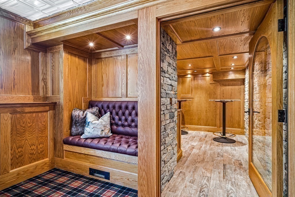 47 Cypress Road Wellesley, MA 02481 - Photo 30 of 36 a view of a hallway with wooden floor and glass door