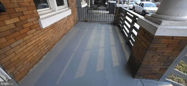 a view of a living room with furniture