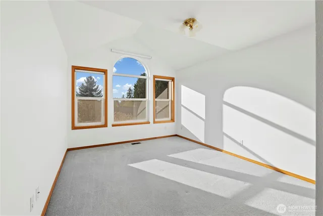 a view of livingroom with furniture and window