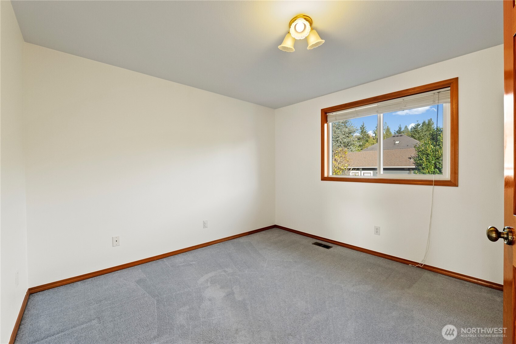 14010 282nd Lane Northeast Duvall, WA 98019 - Photo 20 of 34 an empty room with a window